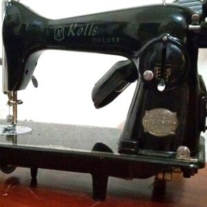 Vintage rolls sewing machine